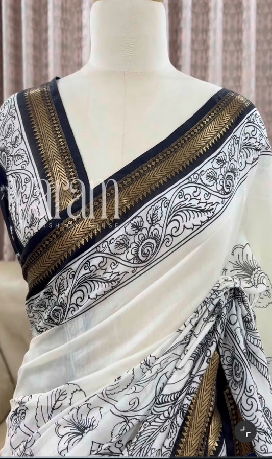 Classic Contrast: Muga Maheshwari Silk with Bold Black Motifs