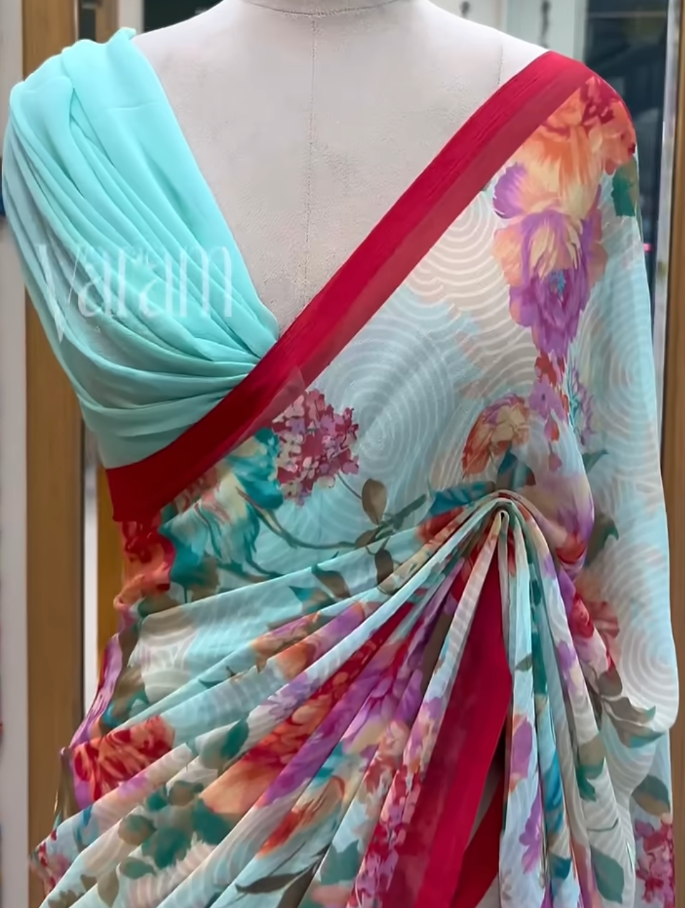 Garden Rhapsody: Artistic Floral Georgette Saree with Contrast Accents
