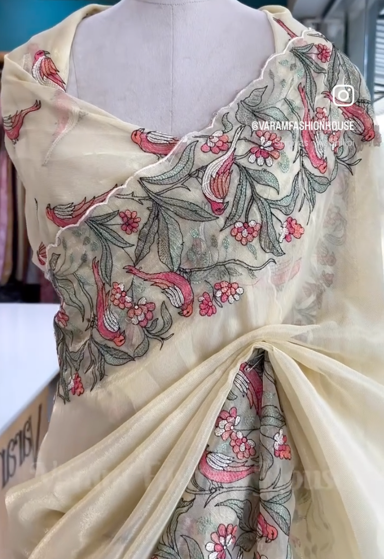 Threaded Elegance on Soft Net Tissue Saree