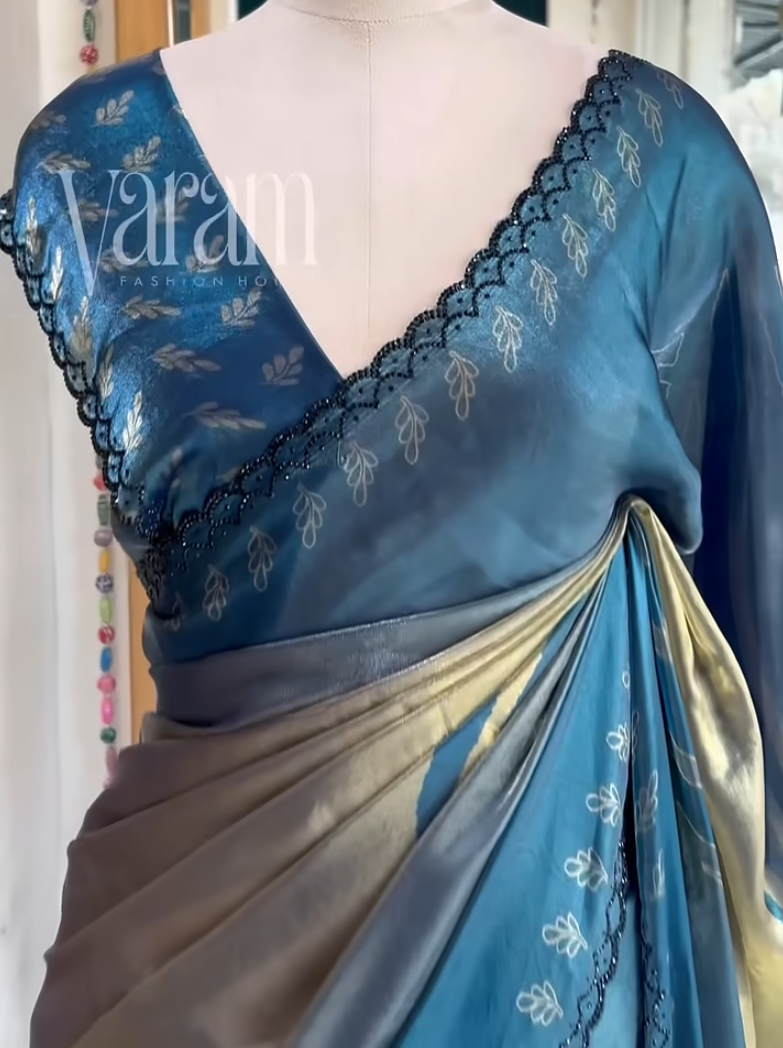 Lotus Reverie: Shimmer Satin Saree with Floral Line Art for Elegant Evenings