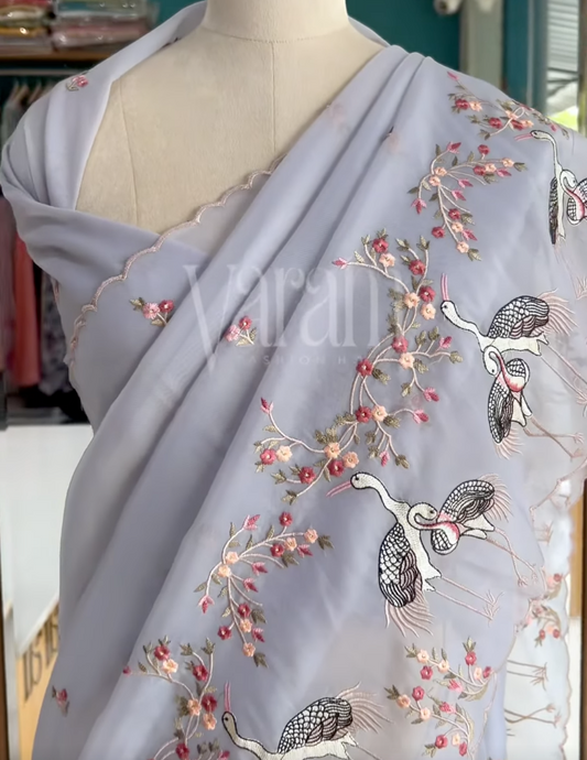 Where nature meets luxury – cranes and florals on Guchi silk Saree