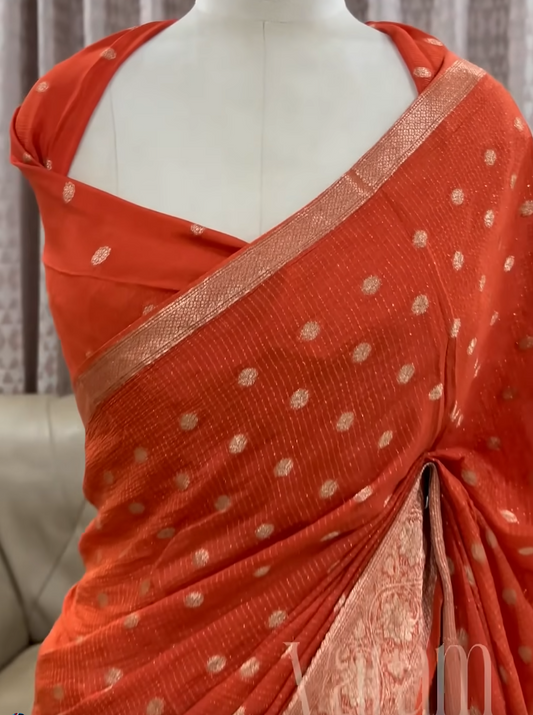Sunlit Glow – Soft Orange Viscose Chinnon Saree with Zari Work